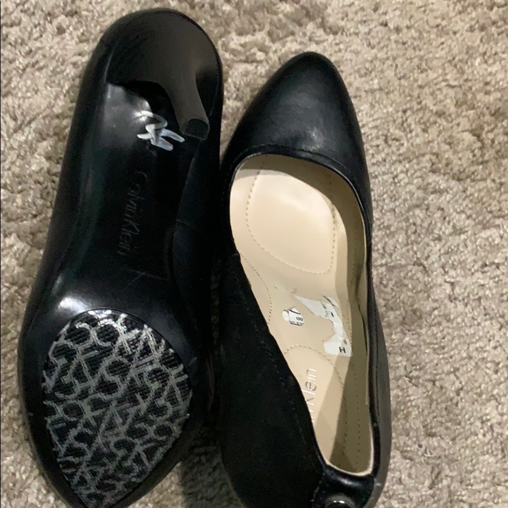 High black heels.